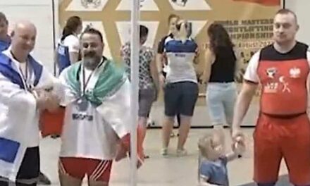 Iranian weightlifter banned for life after shaking hands with Israeli