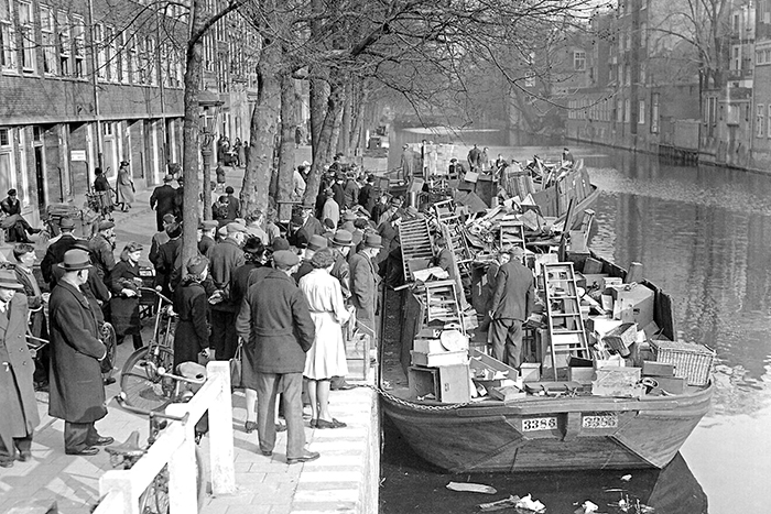 Amsterdam exhibit focuses on neglected aspect  of the Holocaust: looted Judaica, household items