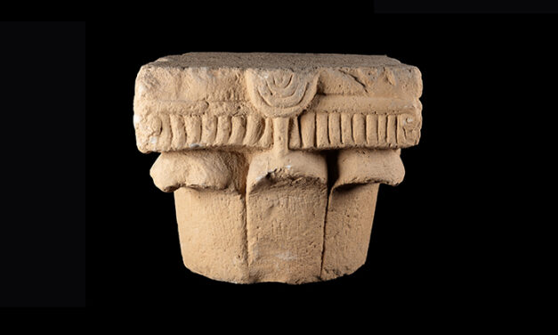 Ancient stone capital depicting a menorah on display