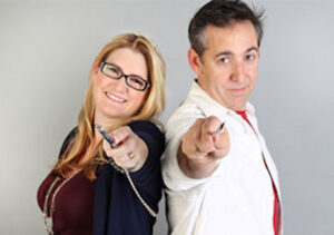 Rabbi Shawna, left, and Isaac Brynjegard-Bialik hold their tools, a yad and an Exacto knife — as they prepare for a session of their Paper Midrash program. Photo courtesy of Paper Midrash.